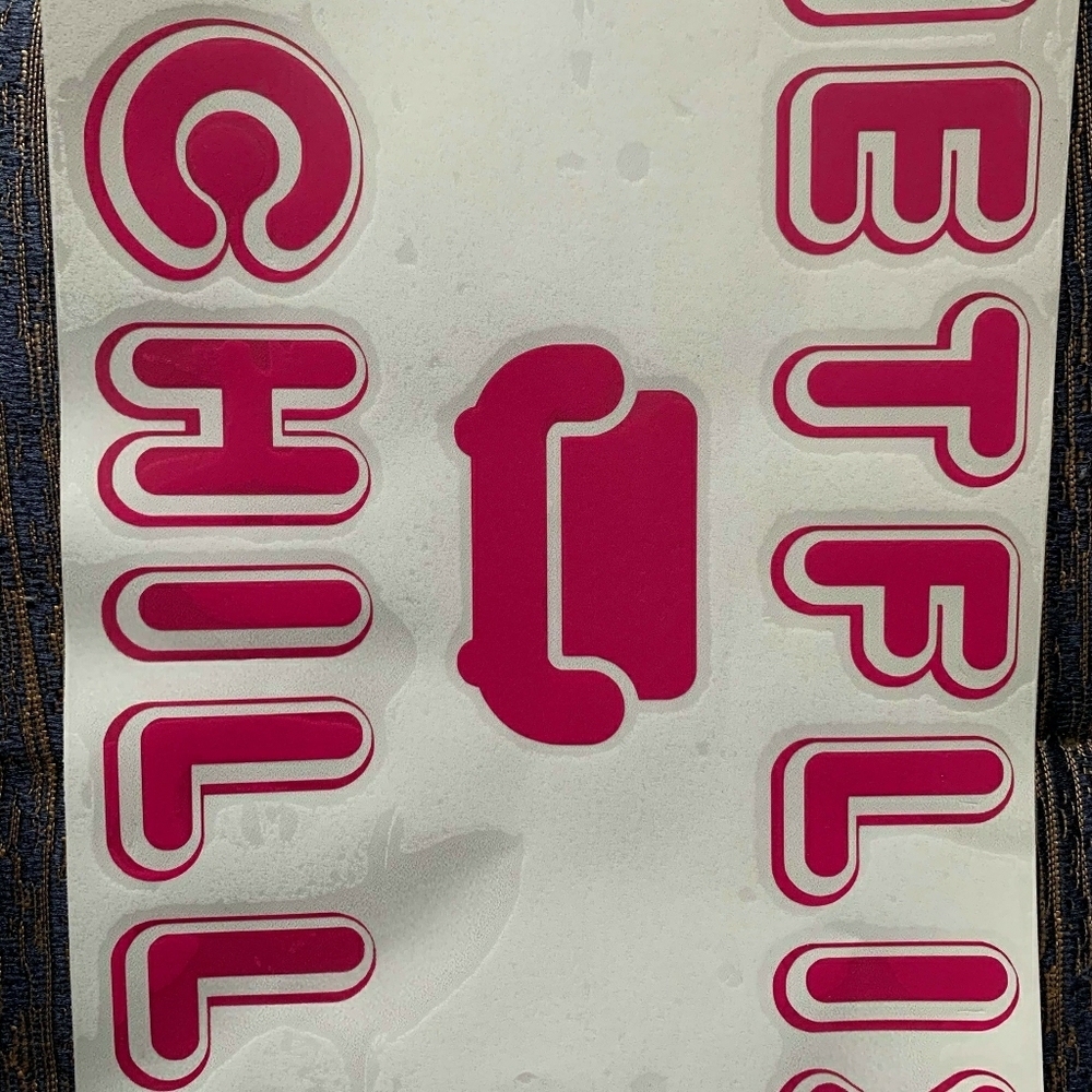 Hot pink Netflix and chill wall or whatever decal